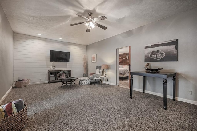 792 195th St, Fort Scott, KS 66701 - carpeted living room featuring ceiling fan, a textured ceiling, and recessed lighting