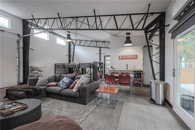792 195th St, Fort Scott, KS 66701 - living room featuring a towering ceiling and speckle patterned floor