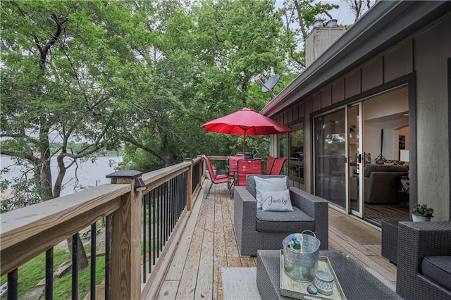 792 195th St, Fort Scott, KS 66701 - wooden deck with outdoor dining area