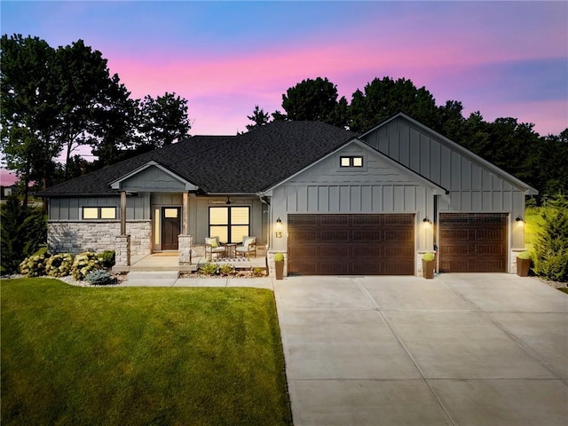 13 Tahoma Rdg, Lake Winnebago, MO 64034 - modern inspired farmhouse featuring board and batten siding, an attached garage, driveway, a front yard, and covered porch