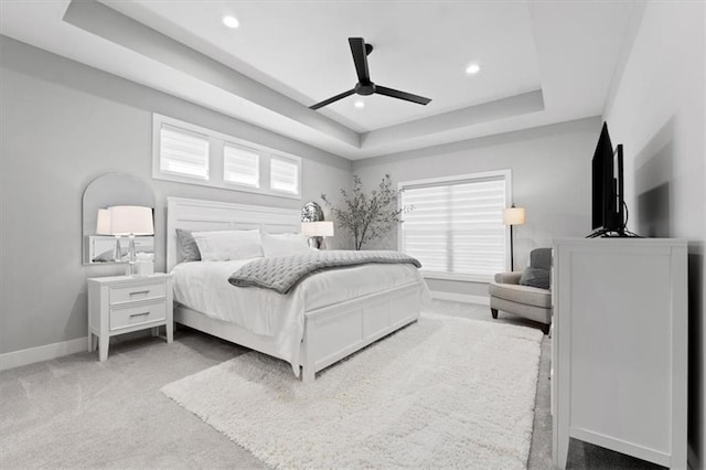13 Tahoma Rdg, Lake Winnebago, MO 64034 - carpeted bedroom with a tray ceiling, recessed lighting, and a ceiling fan