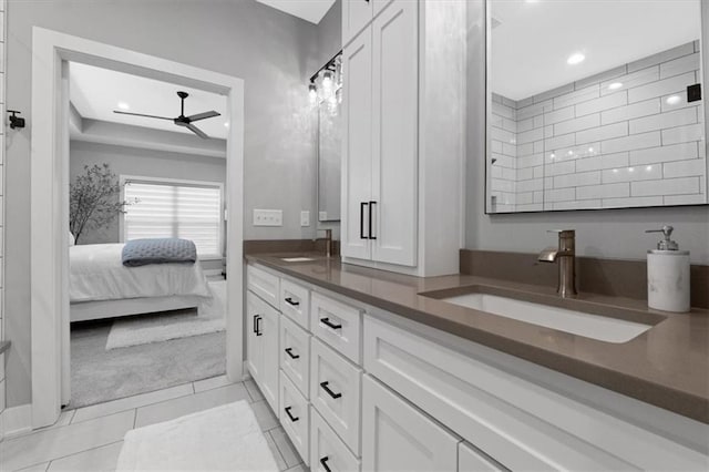 13 Tahoma Rdg, Lake Winnebago, MO 64034 - bathroom with double vanity, ceiling fan, tile patterned flooring, connected bathroom, and recessed lighting