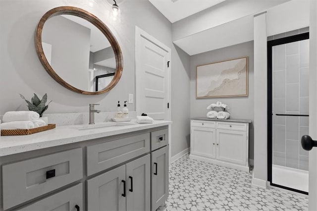 13 Tahoma Rdg, Lake Winnebago, MO 64034 - bathroom featuring tile patterned floors, vanity, and a stall shower