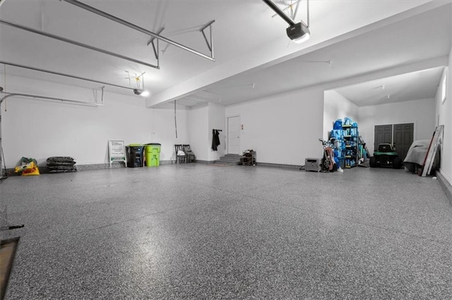 13 Tahoma Rdg, Lake Winnebago, MO 64034 - garage featuring a garage door opener