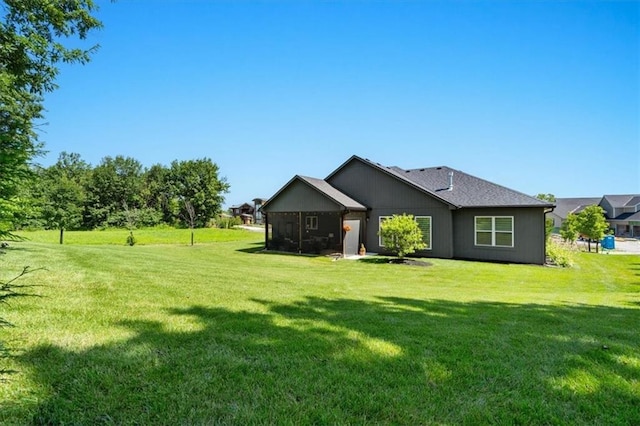 13 Tahoma Rdg, Lake Winnebago, MO 64034 - rear view of property featuring a lawn