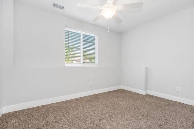 4724 E 135th Ct, Grandview, MO 64030 - empty room featuring carpet flooring and ceiling fan