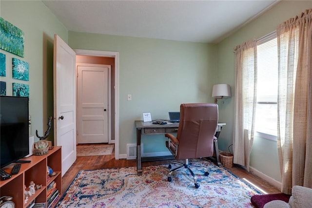 1421 W 28th Ter, Independence, MO 64052 - office space featuring wood finished floors and baseboards