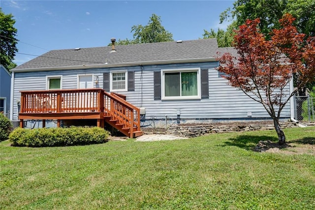 1421 W 28th Ter, Independence, MO 64052 - back of property featuring a wooden deck and a shingled roof