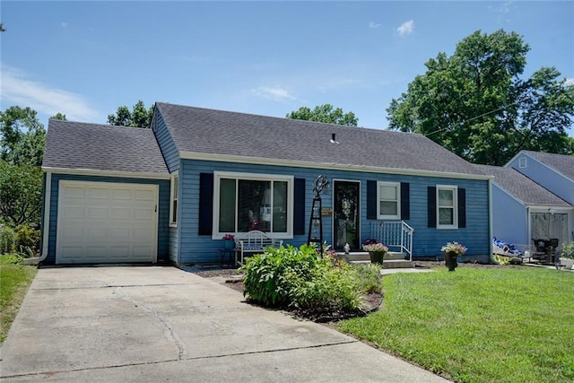 1421 W 28th Ter, Independence, MO 64052 - ranch-style house featuring an attached garage, a front lawn, and driveway