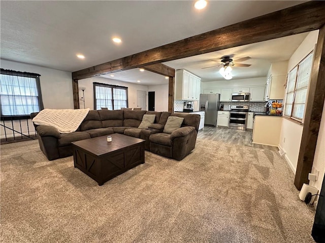 12913 E 41st St S, Independence, MO 64055 - living room featuring carpet floors, recessed lighting, beam ceiling, and ceiling fan