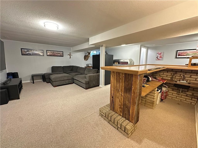12913 E 41st St S, Independence, MO 64055 - living room featuring carpet, a textured ceiling, and a bar