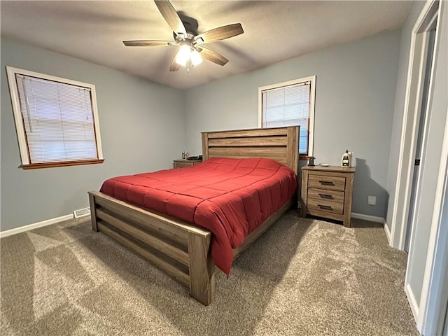 12913 E 41st St S, Independence, MO 64055 - carpeted bedroom with baseboards and a ceiling fan