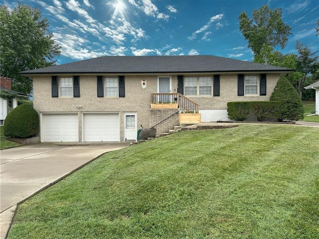 12913 E 41st St S, Independence, MO 64055 - ranch-style home with an attached garage, concrete driveway, a front yard, and brick siding