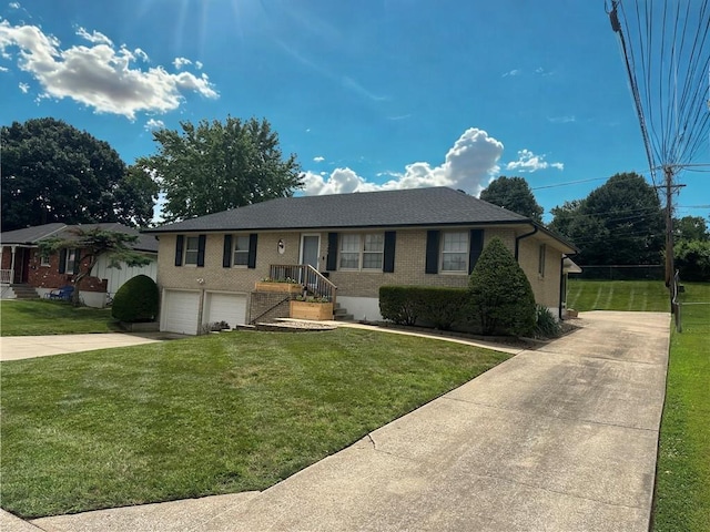 12913 E 41st St S, Independence, MO 64055 - single story home with concrete driveway, a garage, brick siding, and a front yard