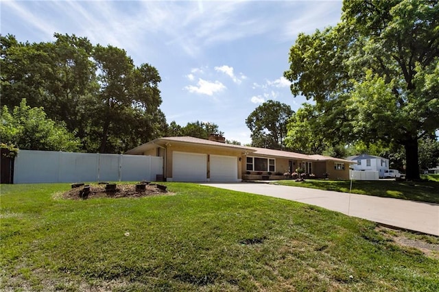 815 N 63rd St, Kansas City, KS 66102 - view of front of property featuring an attached garage, driveway, and a chimney
