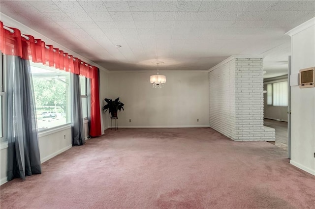 815 N 63rd St, Kansas City, KS 66102 - carpeted empty room featuring a chandelier and crown molding