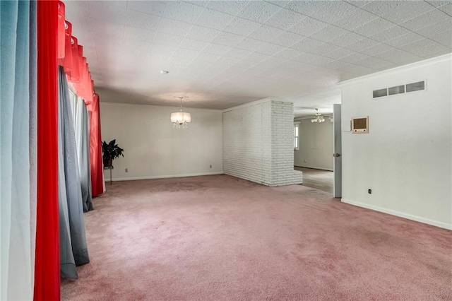 815 N 63rd St, Kansas City, KS 66102 - spare room featuring carpet floors, a chandelier, and ceiling fan