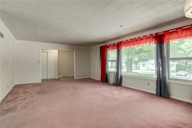 815 N 63rd St, Kansas City, KS 66102 - carpeted empty room with ornamental molding and baseboards