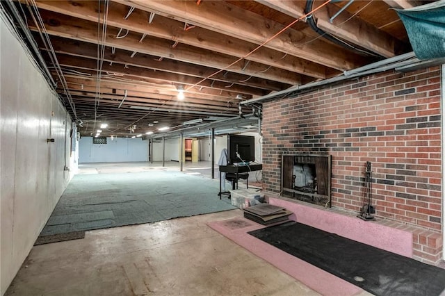 815 N 63rd St, Kansas City, KS 66102 - unfinished basement with a brick fireplace