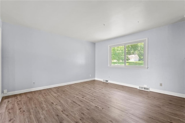 1301 Quincy St, Leavenworth, KS 66048 - empty room featuring wood finished floors