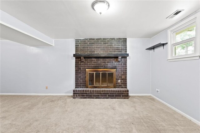 1301 Quincy St, Leavenworth, KS 66048 - unfurnished living room featuring carpet and a brick fireplace