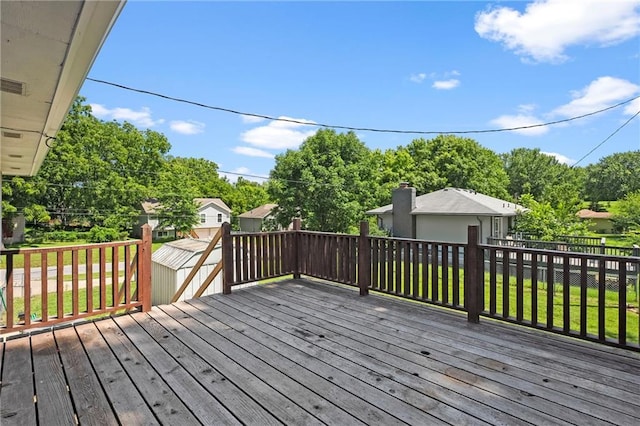 1301 Quincy St, Leavenworth, KS 66048 - wooden deck featuring a storage shed