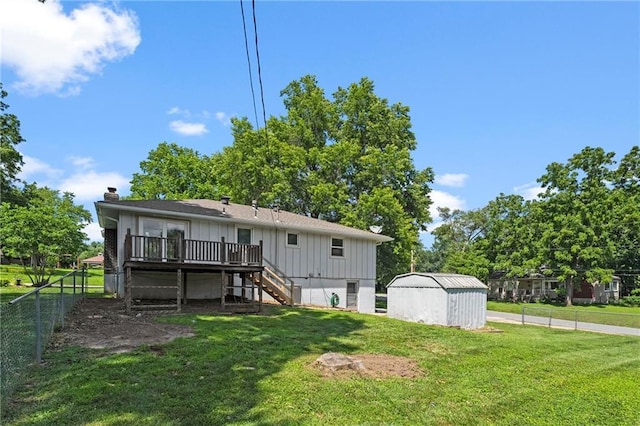 1301 Quincy St, Leavenworth, KS 66048 - back of property with stairway, board and batten siding, a wooden deck, a shed, and a chimney