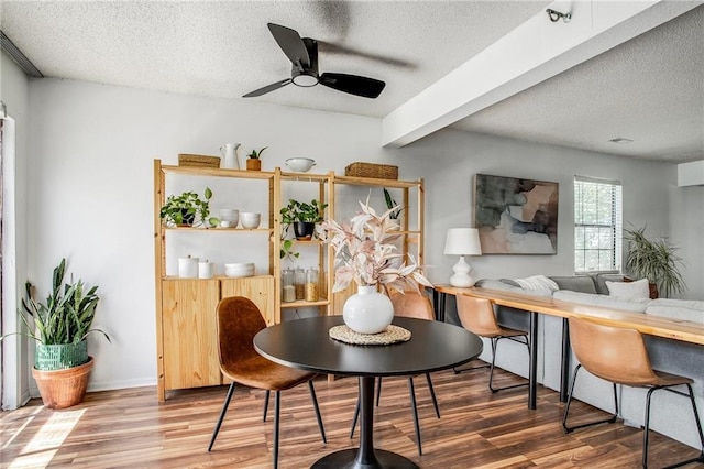 512 NE Brookwood Cir Unit A, Blue Springs, MO 64014 - dining space featuring a textured ceiling, wood finished floors, and a ceiling fan