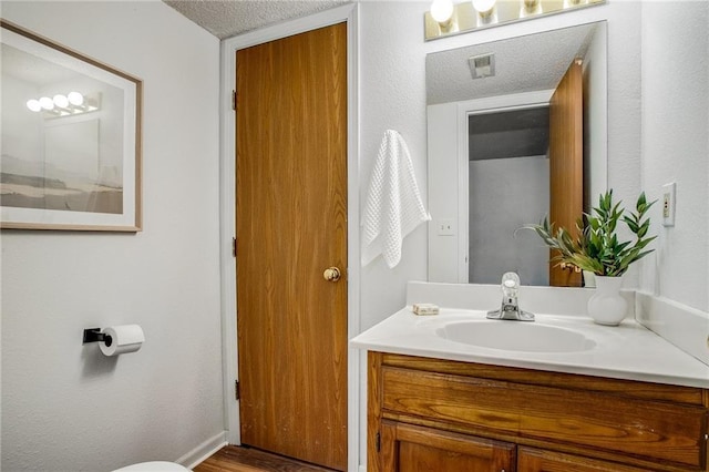 512 NE Brookwood Cir Unit A, Blue Springs, MO 64014 - bathroom featuring vanity and wood finished floors
