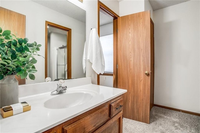 512 NE Brookwood Cir Unit A, Blue Springs, MO 64014 - bathroom featuring vanity and a shower with door