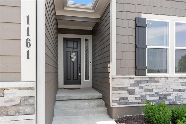 1161 SW Whitby Dr, Lees Summit, MO 64083 - view of exterior entry with stone siding