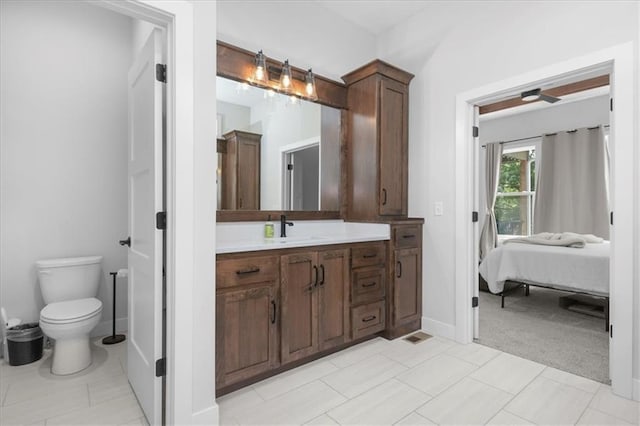 1161 SW Whitby Dr, Lees Summit, MO 64083 - ensuite bathroom with vanity and toilet