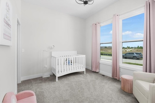 1161 SW Whitby Dr, Lees Summit, MO 64083 - bedroom featuring carpet and a nursery area