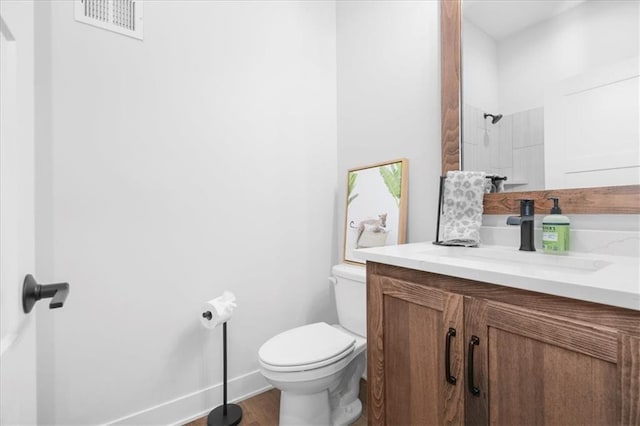 1161 SW Whitby Dr, Lees Summit, MO 64083 - bathroom featuring vanity, wood finished floors, and a shower
