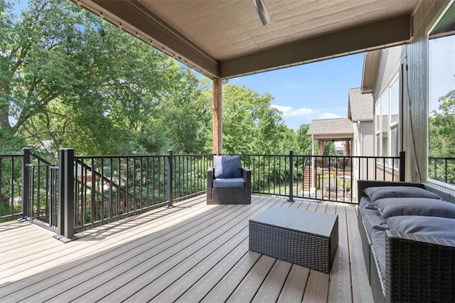 1161 SW Whitby Dr, Lees Summit, MO 64083 - wooden deck featuring view of wooded area and a ceiling fan