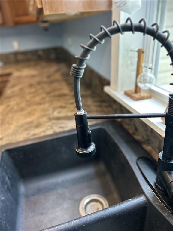 108 W Main St, Arma, KS 66712 - kitchen view of a sink