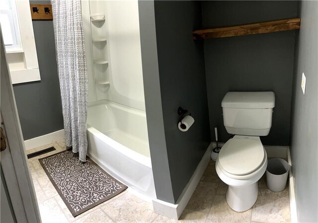 108 W Main St, Arma, KS 66712 - bathroom with toilet and shower / bathtub combination with curtain