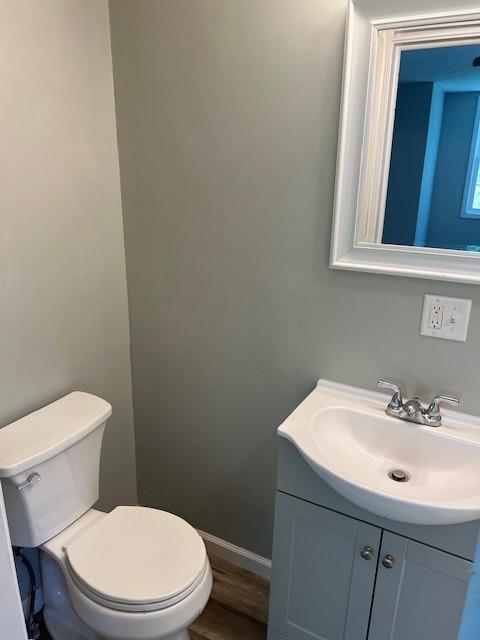 1120 S 20th St, Saint Joseph, MO 64507 - half bath featuring toilet and vanity