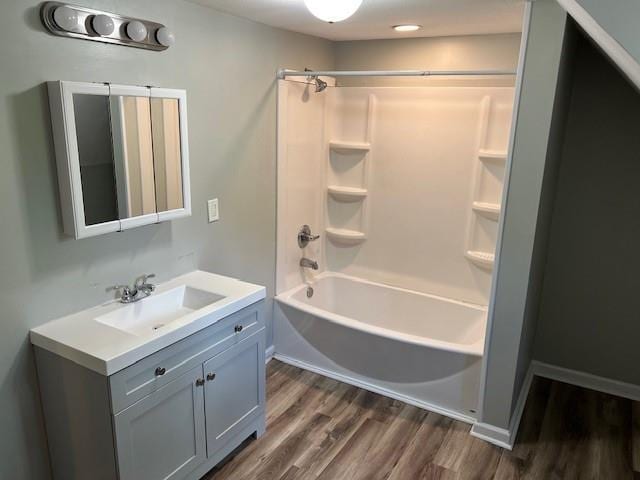 1120 S 20th St, Saint Joseph, MO 64507 - bathroom featuring wood finished floors, vanity, and shower / bath combination