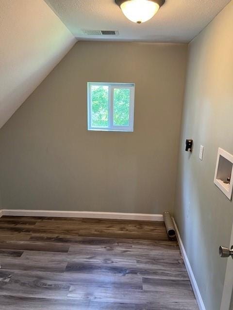 1120 S 20th St, Saint Joseph, MO 64507 - laundry area featuring washer hookup and wood finished floors