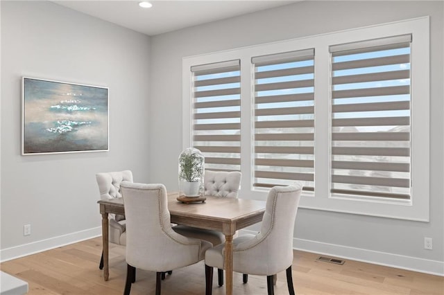 8164 Roundtree St, Lenexa, KS 66220 - dining space with light wood-style flooring and recessed lighting