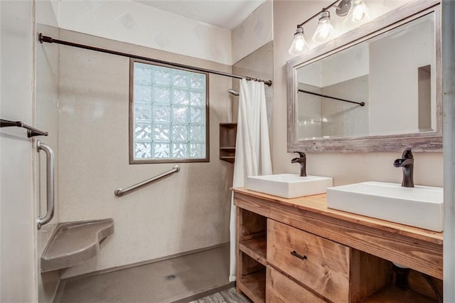 1401 E Mechanic Ave, Independence, MO 64050 - bathroom featuring curtained shower and double vanity