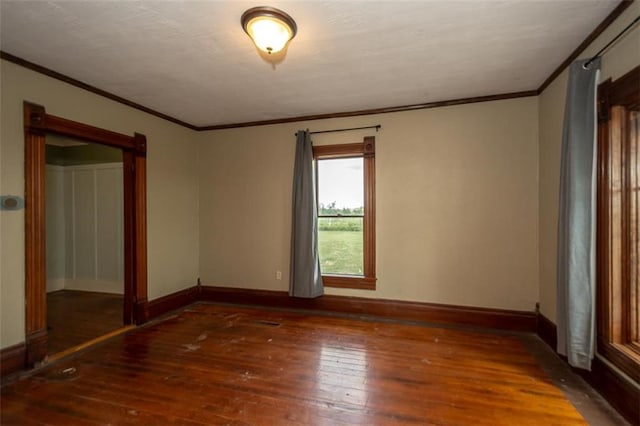 230 N 300th Rd, Overbrook, KS 66524 - spare room featuring wood-type flooring and crown molding