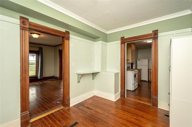 230 N 300th Rd, Overbrook, KS 66524 - empty room with dark wood finished floors and ornamental molding