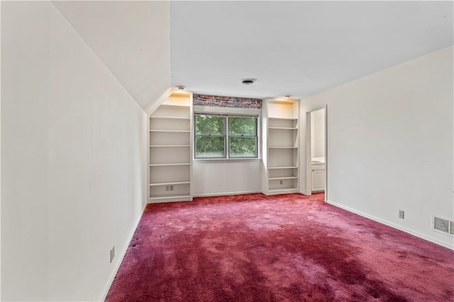14908 E Pawhuska Rd, Nevada, MO 64772 - empty room with built in shelves and carpet