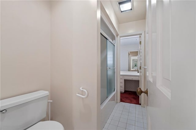 14908 E Pawhuska Rd, Nevada, MO 64772 - bathroom with tile patterned flooring and toilet