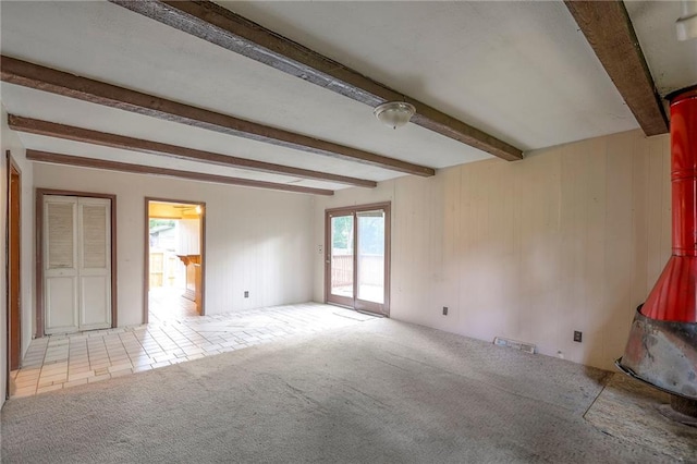 8519 Woodland Ave, Kansas City, MO 64131 - unfurnished room with carpet and beam ceiling