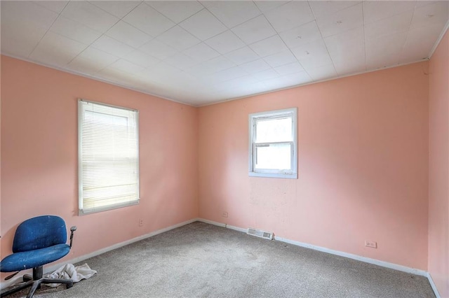 8519 Woodland Ave, Kansas City, MO 64131 - carpeted spare room with baseboards