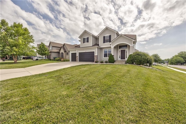 14017 Haskins St, Overland Park, KS 66221 - view of front of property with a garage, driveway, a front lawn, and stone siding