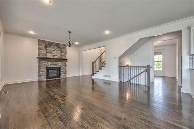 14017 Haskins St, Overland Park, KS 66221 - unfurnished living room featuring a chandelier, dark wood-style flooring, ornamental molding, recessed lighting, and a fireplace